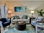 Living room with updated furniture and coastal decor